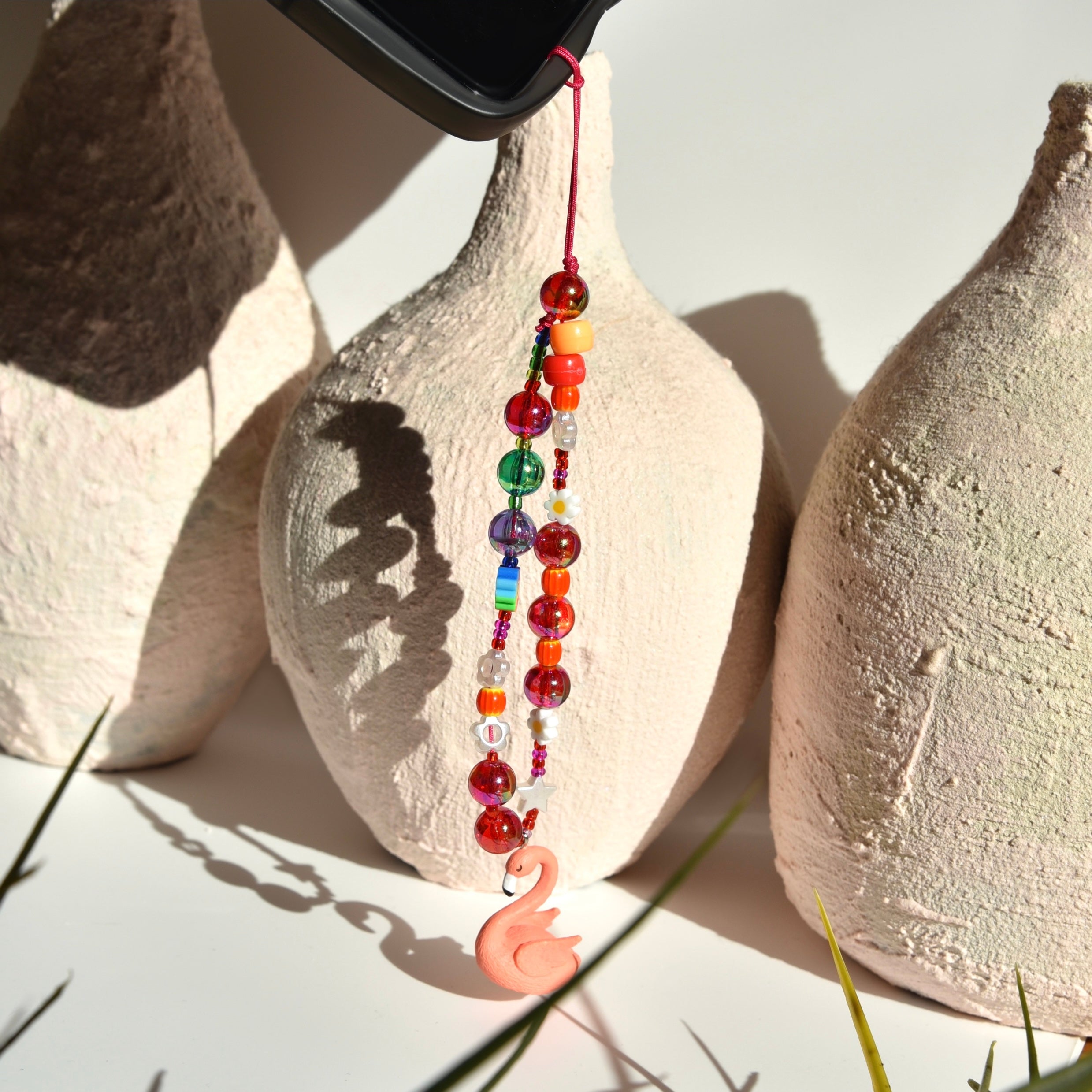 CHARM TELEFONO FLAMINGO