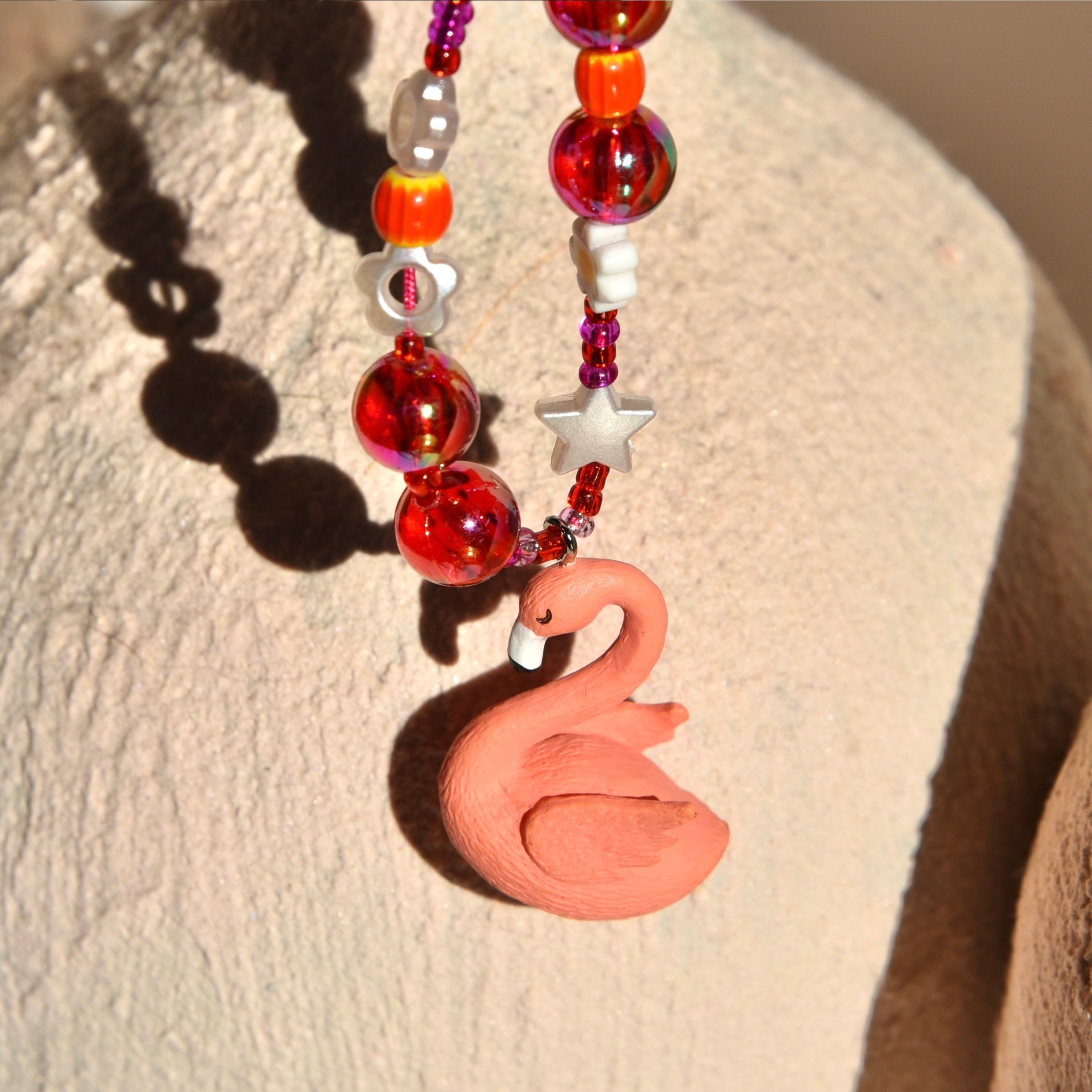 CHARM TELEFONO FLAMINGO